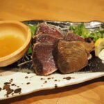 5月中旬の瀬戸内松山大街道アーケードに位置する一進丸カツオのわら焼き